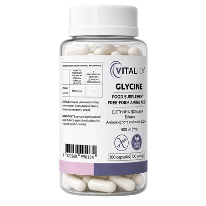 A clear plastic bottle of VITALITA Glycine food supplement with a white cap and a white label, containing white capsules, on a plain white background.
